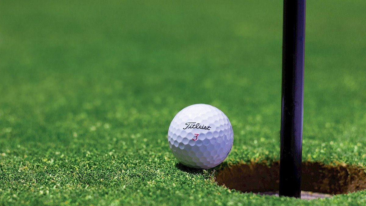 Golf Ball near the hole